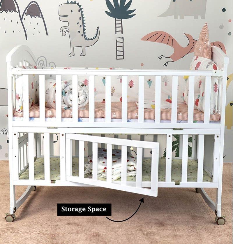 cribs and cradles with baby dedicated large storage space to keep all baby essentials in one place.