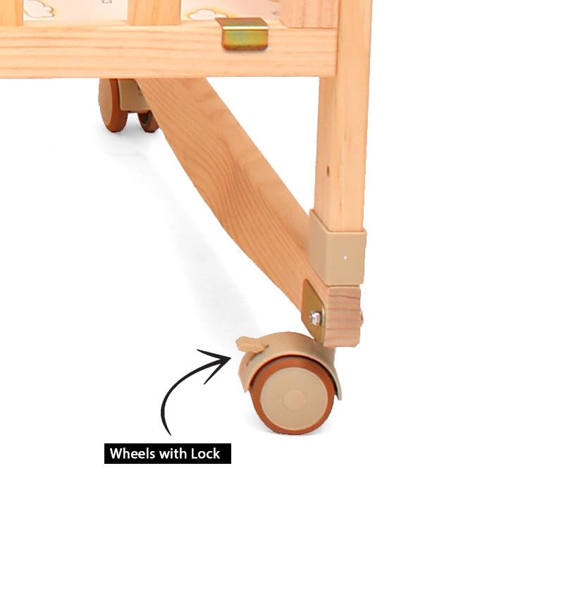 natural crib strong wheels have got foot locks to stop and lock in one place