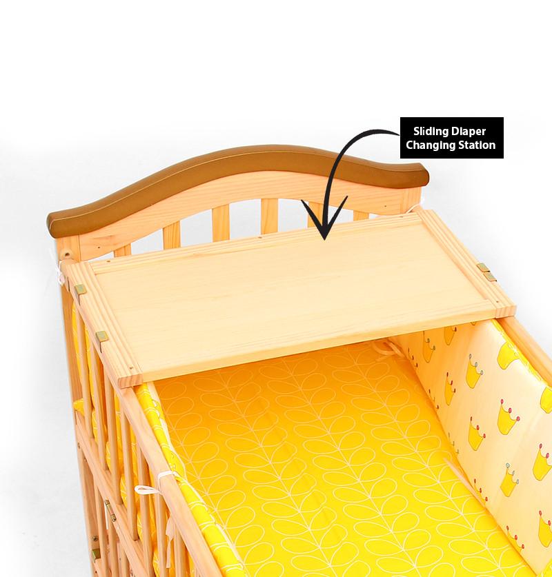 infant cribs with diaper changing platform and beautiful handle design