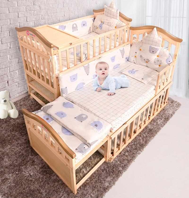 attachable crib to bed shown in 2 size transformation to show how it looks when converted to junior bed