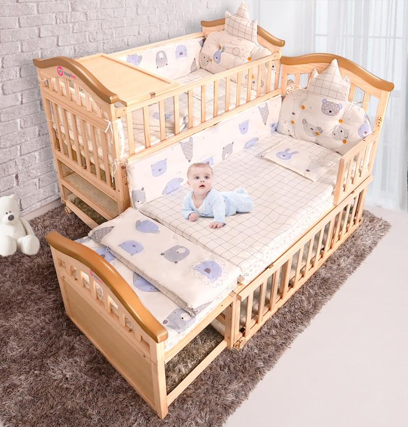crib bed in natural wood color