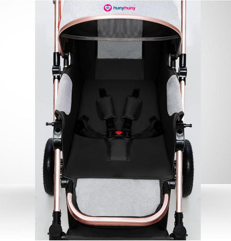 foldable pram with five point safety harness and padded seat